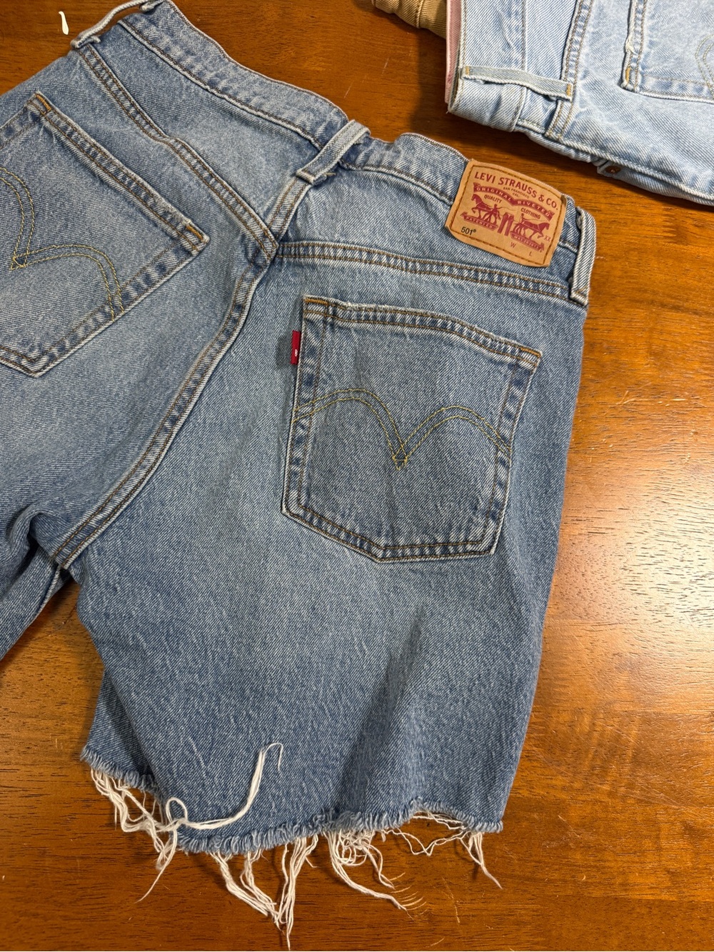 Levi's Light Blue Frayed Denim Cutoff Shorts